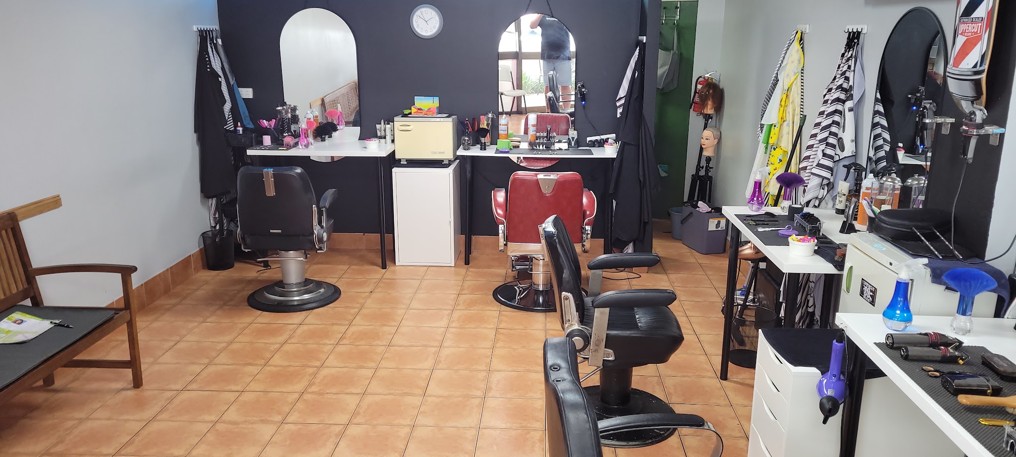 Another angle of the barbershop floor and mirrors